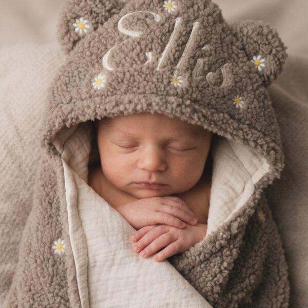 Wikkeldoek geborduurd met naam