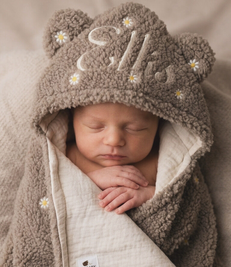 Wikkeldoek geborduurd met naam